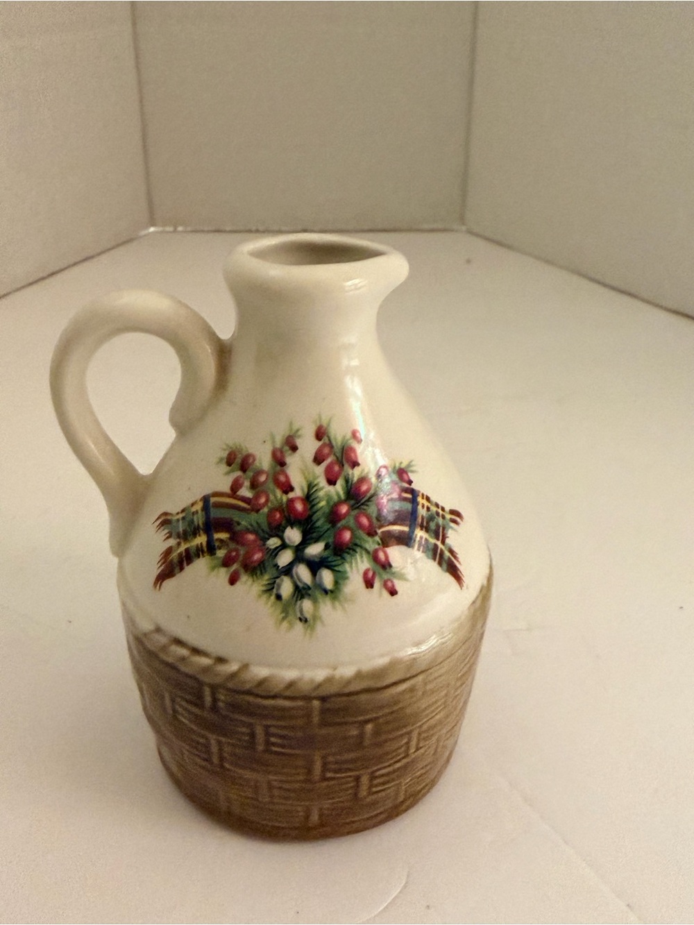 Melrose Potteries miniature whiskey jug, floral design- marked.